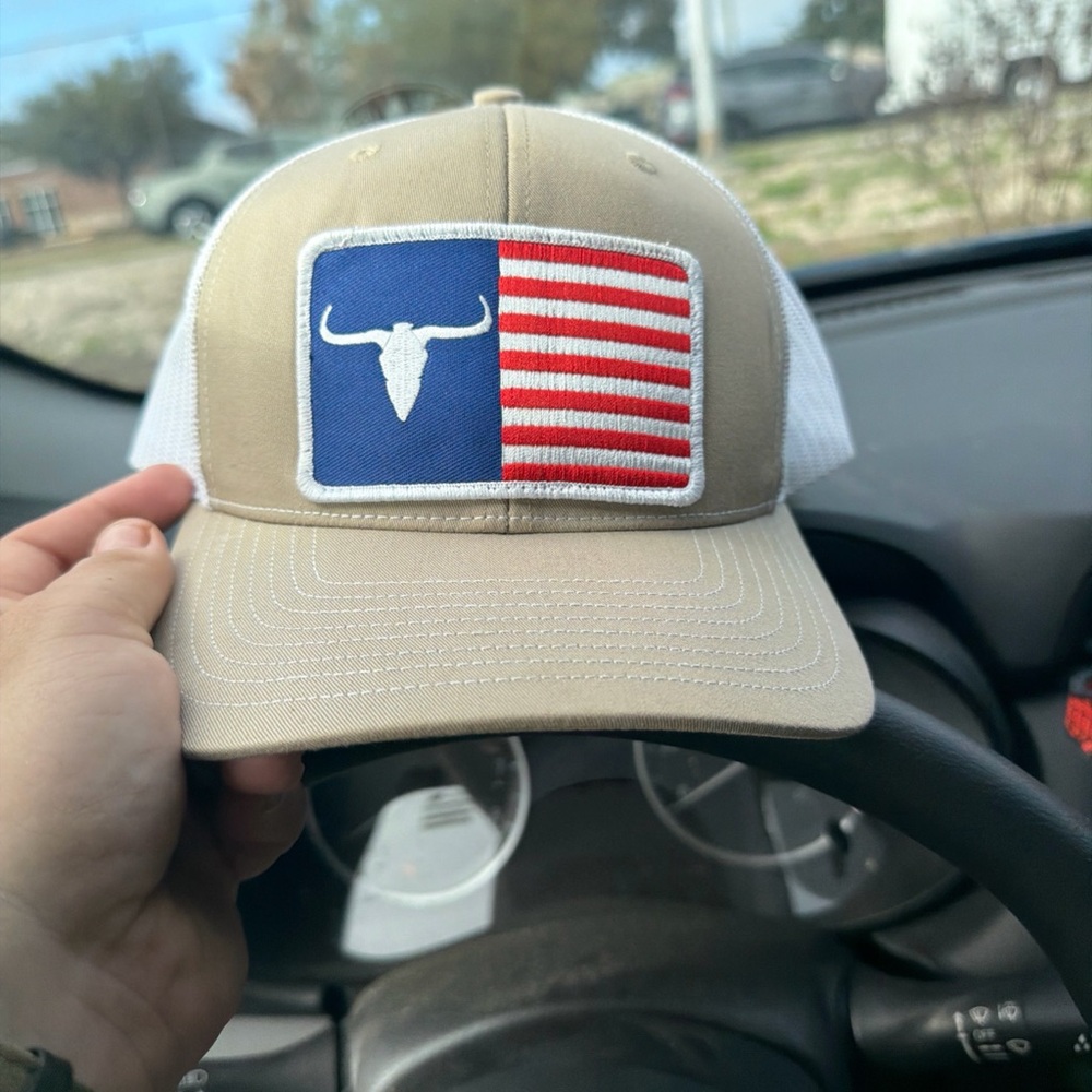 Tan and White Trucker Hat with Blue & Red Flag Patch